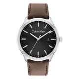 Calvin Klein Men’s Urban Heritage Watch, 43mm stainless steel case, black sunray dial, silver-tone hands and hour markers, date display at 3 o’clock, brown genuine leather strap, quartz movement.