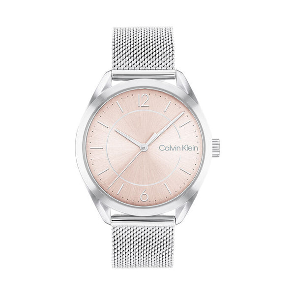 Calvin Klein Women’s Enticing Watch, 36mm stainless steel case, blush pink sunray dial with silver-tone hands and minimalist hour markers, silver mesh bracelet, elegant and modern quartz timepiece.