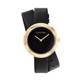 Calvin Klein Women’s Twisted Bezel Watch, 34mm gold-tone stainless steel case, minimalist black dial with gold hands, unique wraparound black leather strap, modern and elegant quartz design.
