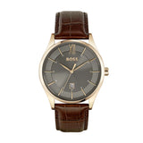 A refined 42mm men's watch featuring a sleek grey dial with gold-tone Roman numerals and markers, accented by a date display at 6 o'clock. The rose gold-tone stainless steel case pairs perfectly with a brown croc-embossed leather strap, creating a sophisticated and elegant look. Ideal for formal and business occasions.