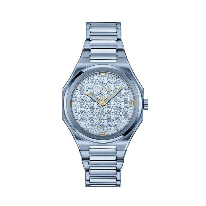 A modern 36mm women's watch featuring a unique silver dial embossed with the "HUGO" logo. The stainless steel case and bracelet shine with a polished finish, while the gold-tone markers and hands provide a touch of elegance. Ideal for those seeking a bold yet refined accessory.
