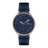 Lacoste Men’s Ollie Watch, 44mm stainless steel case with rainbow bezel, navy blue dial with Lacoste crocodile logo, multicolor hands, textured blue silicone strap, bold sporty quartz design.