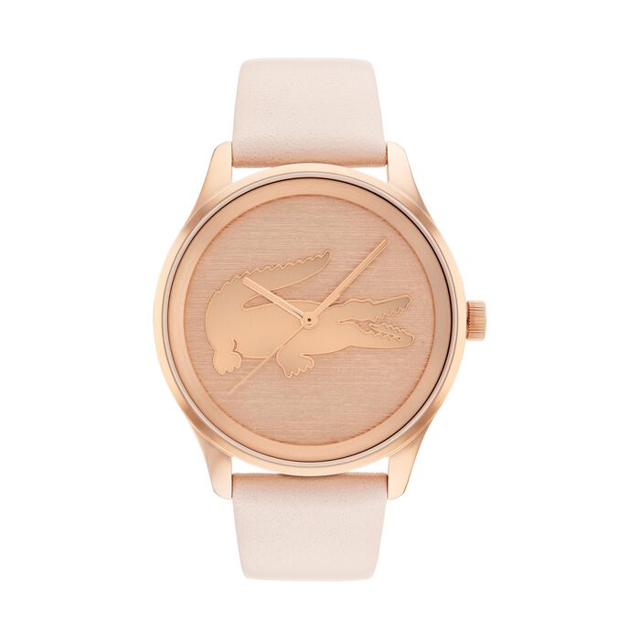 Lacoste Victoria women's watch, 38mm rose gold-tone stainless steel case, brushed rose gold dial with embossed crocodile logo, minimalist design, light pink leather strap.