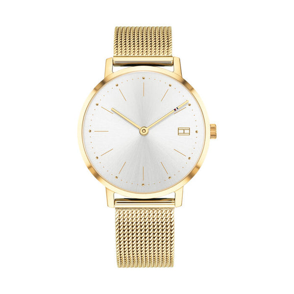 Tommy Hilfiger women's gold mesh watch with white minimalist dial, gold-tone hands and hour markers, and subtle Tommy Hilfiger logo at 3 o'clock.
